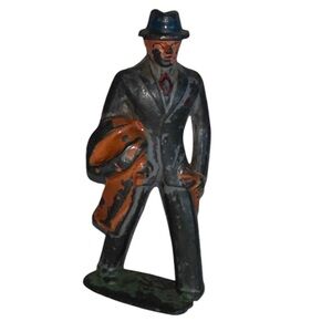 VINTAGE METAL MAN WALKING WEARING BUSINESS SUIT
